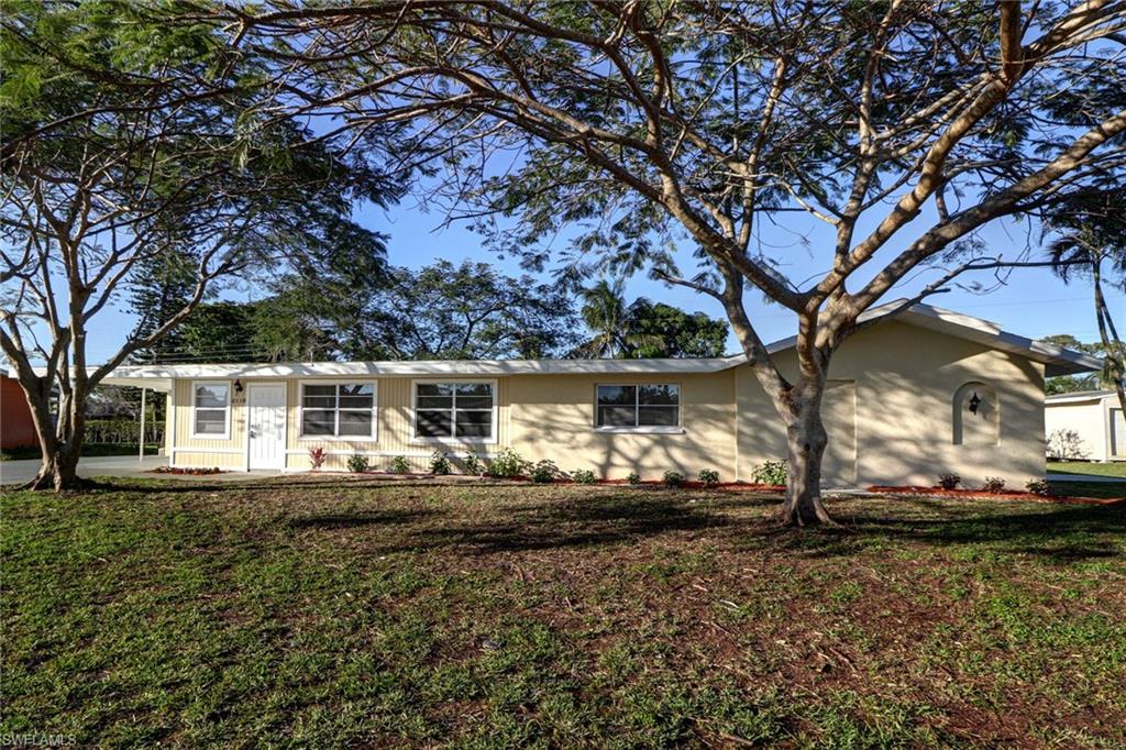 Price reduced to sell!  Premium location at Fort Myers Villas. This 4/2 House is completely remodeled. Tiled throughout. New kitchen with a granite top and stainless steel appliances. New bathrooms, Brand New AC system, Washer and dryer in Laundry room. screened lanai and plenty of room for a pool. Walking distance from dining, shopping, Movies, Bell tower shopping center, etc... Hurry up! This beautiful home at this desirable location will not last long.