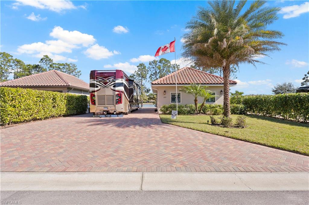 If you are looking for Luxury Living with your Class A or Super C Motorcoach, you have found it here!! This slice of heaven with its lush lakefront location, marvelous sunrise moments, and a fabulous high-end casita can be your very own piece of paradise. The attention to detail really takes this property to the next level. The coach cabana is 840 sq ft under roof with an additional screened lanai so you can really enjoy the indoor/outdoor living we all love here in SWFL. Being located within Golden Palms Luxury Motorcoach Resort will allow you access to activities and amenities for everyone including a heated pool, spa, sauna, exercise room, pickleball courts, a 1-acre dog park for your furry friends, & a 22-acre lake for catch and release fishing. You will be surrounded by nature but only a short drive to restaurants, shopping, golf courses, airports, & Gulf beaches. Welcome Home for the season or all year long!