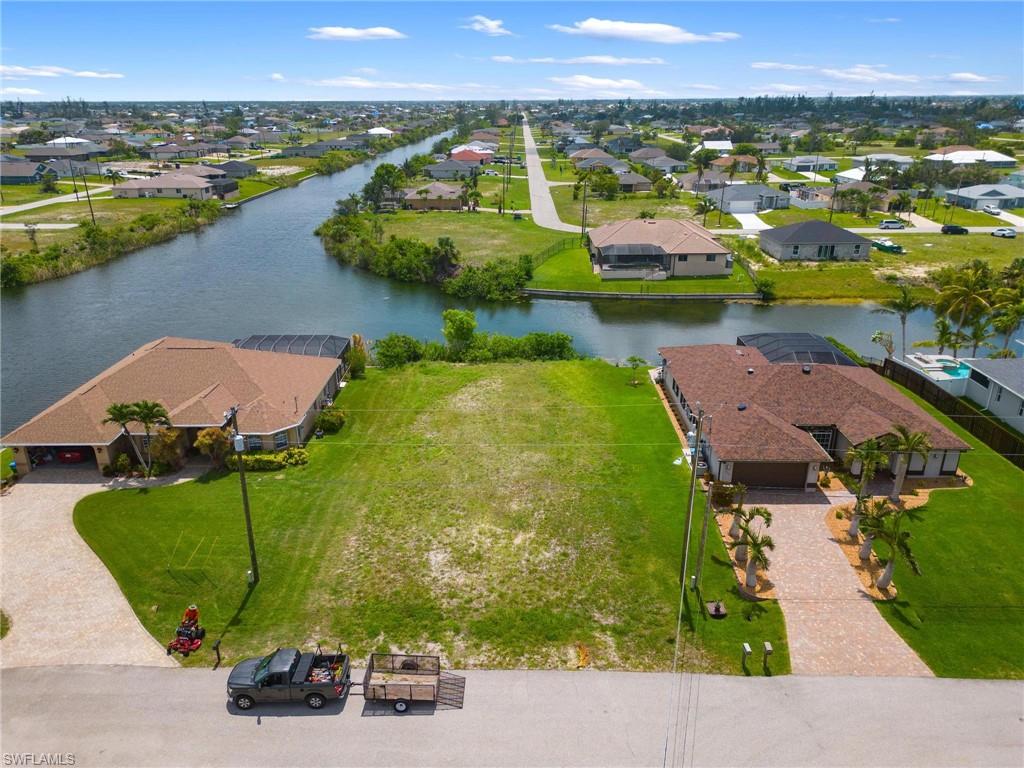Welcome to the perfect waterfront oasis! This vacant lot on a freshwater canal in Cape Coral is the ideal spot to build your dream home or investment property. Located on a peaceful dead-end street and amazing intersecting canal views, this location offers endless opportunities & convenience. Nearby you can find plentiful stores, gyms, activities and much more - not to mention its bike, walk & dog friendly atmosphere. Plus you'll be able to customize your dream home exactly how you'd like! Don't miss out on this incredible opportunity - make this gorgeous location yours today!