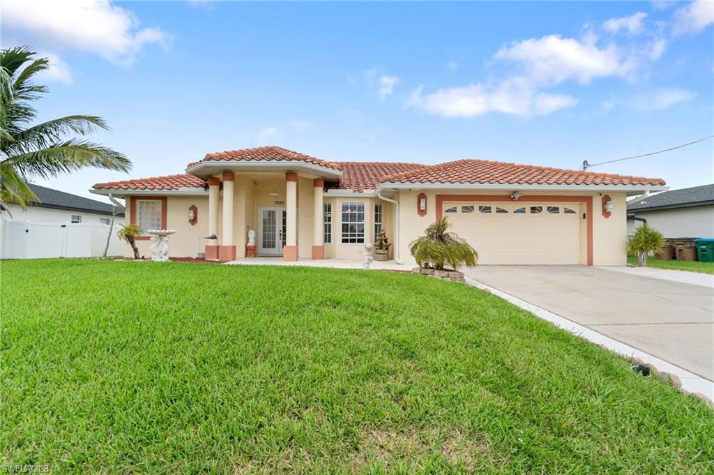 Nestled in the heart of Cape Coral, this stunning 4-bedroom, 2-bathroom home offers a perfect blend of comfort and elegance with 1,998 sqft of thoughtfully designed living space. Imagine waking up to serene western views over a freshwater canal, complete with a seawall and concrete dock—ideal for those who love fishing right in their backyard. Step inside to discover a formal living room and great room, perfect for both entertaining and day-to-day living. The formal dining room and cozy breakfast nook provide versatile dining options that cater to any meal or occasion. The split bedroom layout ensures privacy and convenience, with a dedicated laundry room located on the guest side of the house. This home has been lovingly maintained by its original owners, featuring numerous updates such as a new tile roof and HVAC system, both installed in 2020. The property is not in a flood zone, adding an extra layer of peace of mind. Outdoor enthusiasts will appreciate the screened-in lanai, where you can relax and enjoy the view of the lush backyard adorned with fruit trees including avocado, papaya, mango, coconut, and guava. A shed with electric extends the functionality of the outdoor space, while a widened driveway offers ample parking. Inside, the home boasts granite countertops throughout, adding a touch of luxury to the kitchen and bathrooms. The central location puts you just minutes away from restaurants, shopping, and downtown Cape Coral, making every day errands a breeze. Don’t miss your chance to own this exceptional property that combines natural beauty, modern amenities, and prime location.