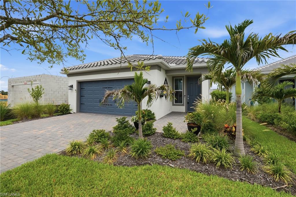 This beautiful, move-in ready home offers 2 bedrooms, 2 bathrooms, a spacious den, and a 2-car garage with an open, light-filled floor plan that's perfect for everyday living and entertaining. The kitchen is the heart of the home with white cabinetry, quartz countertops, a designer tile backsplash, stainless steel appliances, and a large island. You'll also find 22" porcelain tile throughout, 8-foot doors, upgraded laundry room, impact windows and doors, epoxy garage flooring, and a screened covered lanai that's perfect for enjoying Florida's beautiful weather. Both bathrooms feature walk-in showers, including the spacious owner's suite. Located in Del Webb Oak Creek, North Fort Myers' newest premier 55+ gated community, you'll enjoy resort-style living every day. Amenities include a spectacular clubhouse, resort pool and spa, pickleball and bocce courts, fitness center, an active social calendar with a full-time lifestyle director, plus The Oak House Grill & Bar and covered tiki area for dining and gathering with neighbors.

Conveniently located near shopping, restaurants, downtown Fort Myers' River District, Gulf beaches, golf, and everyday conveniences, this home offers the perfect combination of luxury, low-maintenance living, and an active Florida lifestyle.

Available now—come see why so many people are choosing to call Del Webb Oak Creek home!