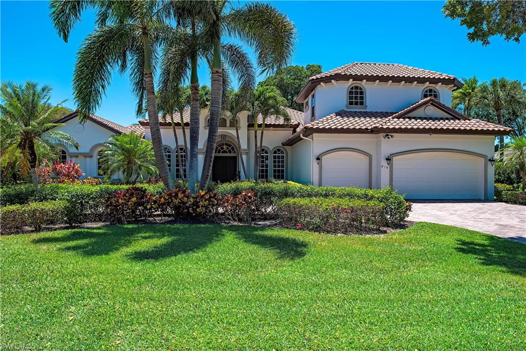 Nestled within the exclusive Pinecrest enclave of prestigious Pelican Bay, this sophisticated two-story estate showcases over 4,245 square feet of refined living space with 5 bedrooms plus a den and 4.5 baths. Blending timeless elegance with modern luxury, the residence has been extensively updated with high-end finishes and a thoughtfully designed layout ideal for both relaxed living and effortless entertaining. The expansive kitchen is a chef’s dream, appointed with top-of-the-line appliances, abundant cabinetry, and a spacious center island that opens seamlessly to the living and family rooms—each with direct access to the screened lanai and the serene outdoor oasis featuring a heated pool and spa. The first-floor primary suite is a private sanctuary with dual walk-in closets, a sitting area, and a spa-inspired bath with dual vanities, a soaking tub, and a separate shower. A dedicated den with custom built-ins offers flexible space for a home office or library, while a generously sized upstairs guest suite provides comfort and privacy for visitors or extended family. Additional features include impact-resistant glass throughout, a central vacuum system, a three-car garage with ample storage, and new HVAC systems and water heater. As part of the prestigious Pelican Bay community, residents enjoy unparalleled amenities including private beachfront access with two exclusive beach clubs, beachfront dining, tennis, pickleball, a state-of-the-art fitness and wellness center, kayaking, and miles of scenic walking and biking trails—all just moments from the luxury shopping and fine dining of Waterside Shops and the world-class performances at Artis—Naples.