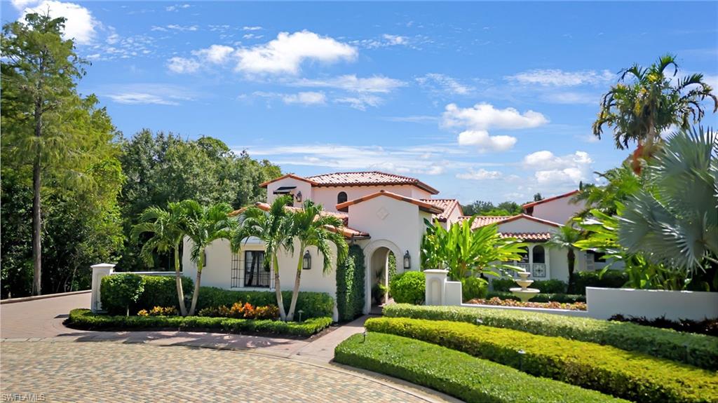 This gorgeous custom home is located in the exclusive Mirada neighborhood of Estuary at Grey Oaks. Featuring nearly 5,000 square feet of living space, this immaculate residence showcases high-end finishes and exquisite quality. A grand two-story foyer, with elevator, four full bedrooms with en-suite bathrooms, study, a chef's kitchen, and an expansive outdoor living area with resort-style pool, spa, waterfall and fire features are just a few of the inviting features this home has to offer. The outdoor living area consist of a gas fire pit, outdoor kitchen and motorized screens overlooking magnificent lake and golf course views. No detail was overlooked with impact doors and windows, climate controlled 4 car garage. With the option of applying for Golf or Social membership at Grey Oaks Country Club you will have 54 holes of golf, newly renovated wellness center, lagoon style pool, tennis, pickle ball, bocce, restaurants, spa, and extensive amenities at your fingertips. All just minutes from downtown Naples world-class shopping fine dining and white sand beaches.