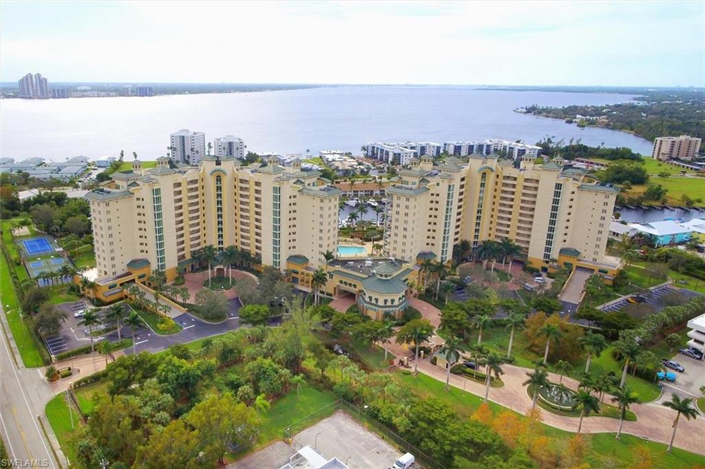Amazing Riverfront Living–Sunrise Views from the 4th Floor! Wake up to panoramic sunrise views over Sunset Harbor Village Marina from this stunning 4th-floor retreat at the prestigious North Star Yacht Club. Perfect for lower level perspective living. This custom upgraded Capricorn model showcases the very essence of Florida waterfront living — where luxury meets lifestyle, and every day feels like a vacation. Step into nearly 1,800 square feet of thoughtfully designed elegance, featuring soaring 9-foot floor-to-ceiling impact glass windows that flood the space with natural light and frame jaw-dropping vistas of the river, resort-style pool, and private marina. Whether you're sipping coffee at sunrise or enjoying a glass of wine at dusk, the southeastern exposure ensures your home is always bathed in warmth and beauty. The open-concept floorplan flows effortlessly with new Coretec flooring throughout all living areas. Recent updates include: New custom kitchen with counter seating, quartz counters, deep sink, modern fixtures and ceiling fans, smudge-proof stainless appliances and reverse osmosis under cabinet water filtration system. New hot water heater (2023) Newer HVAC in 2017. Whole house Kinetico water filtration system. Tile in laundry room. Freshly painted throughout. Your spacious owner’s suite is a sanctuary of comfort, complete with dual walk-in closets featuring hardwood shelving, and a spa-inspired bath with separate vanities, a soaking tub, and walk-in shower — perfect for unwinding after a day on the water. Bonus are two covered parking spaces - 1 first floor and 1 second floor with a private storage locker.  Partially furnished with living room, kitchen and second bedroom. Den and Main suite empty.  Resort-Style Amenities on the Waterfront North Star Yacht Club sits on over 12 acres of lush, manicured grounds along the riverfront, offering an unmatched array of amenities that cater to your active and social lifestyle: Expansive resort-style pool and spa Lap pool, BBQ areas, and scenic walking trails Tennis, pickleball, bocce ball, and volleyball courts Private dog park just expanded State-of-the-art fitness center and yoga studio Theater room, billiards lounge, business center, and renovated clubhouse with kitchen A vibrant community with regular social events, fitness classes, and clubs Follow the private path along the waterfront to restaurants, cafés, salons, and boutiques—all just a stroll away.  If you've been dreaming of a sophisticated, low-maintenance lifestyle on the water — where luxury meets community and every detail is taken care of — this is your moment. Live the Waterfront Life at North Star!