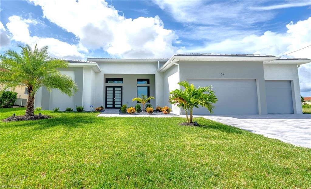 WELCOME TO THIS NEWLY BUILD LUXURY HOME BY THE WATER 3 Bed + Den + 3 Bath + 3 CAR GARAGE, HEATED POOL + SPA, SOUTHERN EXPOSURE FOR LOTS OF SUNLIGHT THROUGHOUT THE HOUSE! OUTDOOR KITCHEN, BEAUTIFUL STREET WITH NEWER HOMES! ALL HIGH IMPACT WINDOWS FOR COMFORT, LOWER ENERGY BILLS AND LOWER INSURANCE COST! CITY WATER! NO FLOOD ZONE! 12' CEILINGS, TRAY CEILINGS WITH INDIRECT LIGHTNING. YOU WILL SEE MANY UPGRADED FEATURES IN THIS HOME PREMIUM SAMSUNG APPLIANCES, EXQUISITE QUARTZ COUNTERTOPS, SOFT CLOSE CABINETS, WALKTHROUGH SHOWERS, HIS & HERS CLOSETS, INVITING POOL AREA WITH PANORAMA SCREENS FO EXCEPTIONAL VIEWS. SPACIOUS PAVED SUND DECK PROVIDES LOTS OF ROOM FOR LOUNGE CHAIRS. CALL THIS HOME YOUR FIRST RESIDENCE OR GENERATE VERY GOOD INCOME AS A VACATION RENTAL!