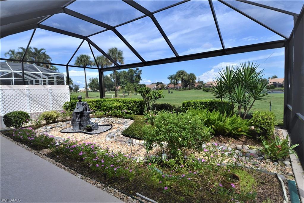 3 YEAR NEW ROOF AND BRAND NEW MEGA VIEW PANEL SCREEN CAGE ON THIS FREE STANDING AUGUSTA MODEL.  GORGEOUS GARDEN LANAI AREA WITH BEAUTIFUL GOLF COURSE VIEWS.  HARDWOOD FLOORS IN MAIN AREAS AND CARPET IN BR'S.  LARGE EAT-IN KITCHEN WITH WOOD CABINET DOORS, GRANITE, DOUBLE PANTRIES AND DESK SPACE, DEN WITH WOOD BUILT-INS, MASTER SUITE HAS PRIVATE OUTDOOR COURTYARD, WALK-IN CLOSET AND OVER SIZED SHOWER, GUEST BR IS EN SUITE, LAUNDRY ROOM WITH TUB, 2.5 CAR/GOLF CART GARAGE AND MORE.  MUST SEE ! !  SOCIAL CLUB MEMBERSHIP INCLUDED FOR ALL HOMEOWNERS.  AFFORDABLE GOLF DUES ARE OPTIONAL.  CLUB HAS RESTAURANT, OUTDOOR BAR, RESORT STYLE POOL, PRO SHOP AND TENNIS COURT.