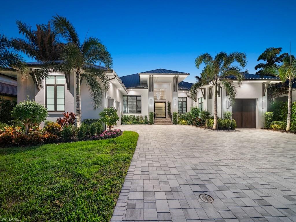 “Clean lines and a sophisticated design define this coastal contemporary home, located in the heart of the Moorings neighborhood.”