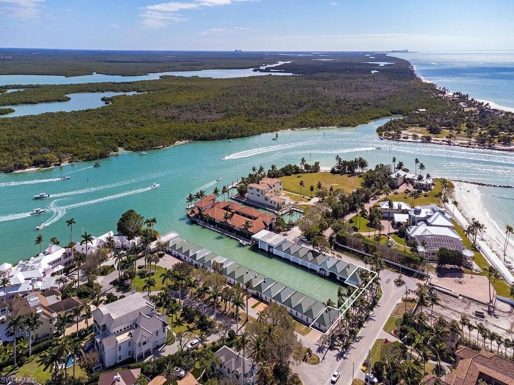 This is a one-of-a-kind yachting opportunity adjacent to Gordon Pass and includes a 93 ft. deeded dock plus two covered and completely renovated boathouses by Newbury North. Offering direct, immediate access to the Gulf of Mexico, new Owners also benefit from having private, off-street parking for multiple vehicles, shore power, fresh water, a 7,000 lb. lift in the south boathouse, as well as a 16,000 lb. lift in the north boathouse. This truly unique property is an ideal way to protect your prized watercraft all the while in the rare and desirable Cutlass Anchorage location.