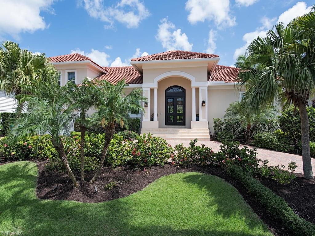 This fully remodeled home offers unrestricted deep water access to the Gulf of Mexico off Naples Bay. The expansive 5 bedroom + den residence is a gem for boaters with its 84' Azek dock complete with hidden fasteners, 13,000 lb boat lift, double jet ski lift, fillet table and snook lights. The property offers an open floor plan providing abundant natural light through double sliding glass doors looking out to beautiful water vistas.
The heated salt water pool can be viewed from most rooms offering a lush, tropical feel. Walnut floors feature throughout, along with a private guest suite, a sunny, spacious custom kitchen with double islands, wine chiller,
large walk in pantry with custom shelving and expansive pool deck for sunbathing or relaxing with friends and family. In close proximity to Naples famed white sandy beaches and the famous 3rd Avenue shopping and dining district, this is a must-see property in highly desirable Aqualane Shores.