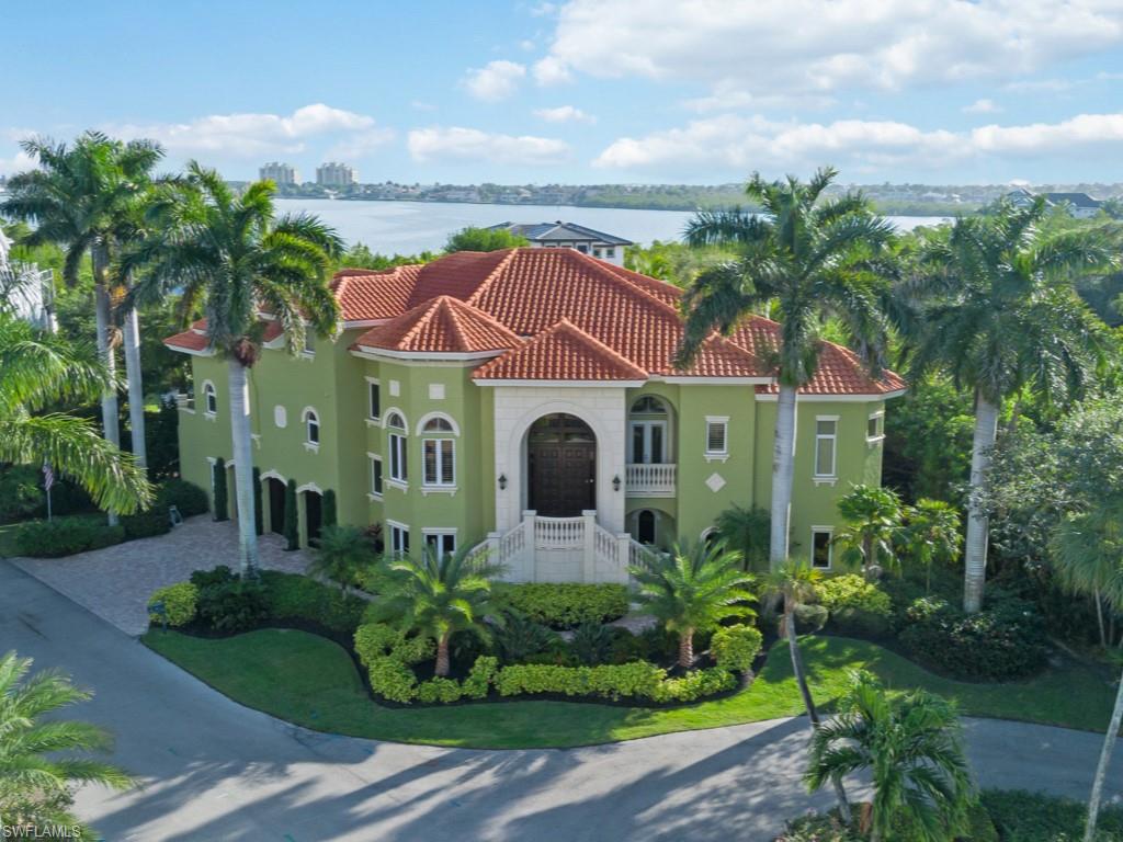 Fabulous home designed for entertaining w/ plenty of room for large families! Located close to the beach in the exclusive Hideaway Beach Club, you must "see to believe" this luxurious Marco Island residence! The main living level offers a formal living room, formal dining room, chef's gourmet kitchen w/ professional grade appliances, casual dining room, family room w/fireplace, powder bath, laundry room & spacious master bedroom suite. Upper level has 2 additional guest suites & balcony. Elevator from the garage to main living level, custom woodworking, cast trim, slate flooring-beautiful finishes throughout. Massive wine cellar & 5-car garage. Infinity edge swimming pool & pa was built up to the main living level, slate pool deck is perfect extension of living area, outdoor kitchen, plenty of room to relax or enjoy outdoor dining poolside.  World-class Hideaway Beach Club is a private, gated country club with incredible amenities such as a fantastic beach, 9-hole executive golf course, tennis, bocce, pickle-ball, fitness club, exercise classes, pro shop, beach side dining, 3 newly renovated dining venues, social events galore, 24-hour personnel at the entry gatehouse and more!
