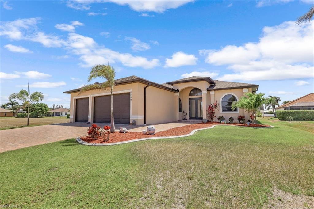**MULTIPLE OFFERS RECEIVED - HIGHEST AND BEST BY 5:00 THURSDAY 5/27.  Better than new!  Prepare to be impressed - built in 2019, this beautiful 3/2 custom home with 3 car garage is in a fantastic NW Cape Coral neighborhood.  Professionally landscaped with concrete curbing, paver drive and entry, and a lush green lawn.  Stepping inside, you are greeted with a 15' ceiling in the entry way and an open floor plan with great room, 11' ceilings, 24" tile and crown molding throughout.  Spacious kitchen has a designer backsplash, quartz countertops, ss appliances, wooden cabinetry and breakfast bar.  A perfect home to entertain!  The oversized screened lanai is tiled and extends the length of the home - room for a pool too!  The 2 guest bedrooms share a bath and are split from the master.  Spa like master bath with dual sinks and a walk-in closet.  Other custom touches include several tray ceilings, electric fireplace with custom wall treatment, and double entry doors with frosted glass.  Impact doors and windows too!  Why wait 12 months for a new home when this is better than new home is ready for you now?  Call today to schedule your private showing!
