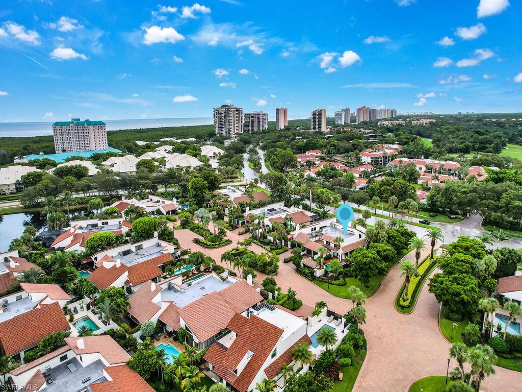 A rare opportunity to own a spacious 2-story, 4 bedroom, 3.5 bath villa with 3000 square feet of living area in highly sought after Tierra Mar in Pelican Bay. Surrounded by a privacy wall & tropical foliage, the private pool & spa enjoy a sunny Southern exposure. The architecturally stunning living room has a vaulted ceiling, dramatic beams, soaring fireplace and mitred corner windows providing views of the courtyard. Two ensuite bedrooms on the first and second floor and two additional bedrooms each have access to private outdoor areas. Pelican Bay is Naples’ premier exclsuive beachfront community with miles of private beach, mangroves, nature paths & biking trails, exclusive beachfront resort amenities, 2 beachfront bars & restaurants, beach services & beach tram!  Offering a full-service state of the art fitness center, wellness center with personal training, yoga, spa & art studio, 2 tennis complexes with pro shops, canoe & kayak launches. And private golf membership at the Club of Pelican Bay’s 27 hole Arthur Hills golf course. Close to upscale dining, shopping, hotels & entertainment at Waterside Shops, Artis & Baker Museum.  Minutes to Olde Naples 5th Avenue S & 3rd Street!