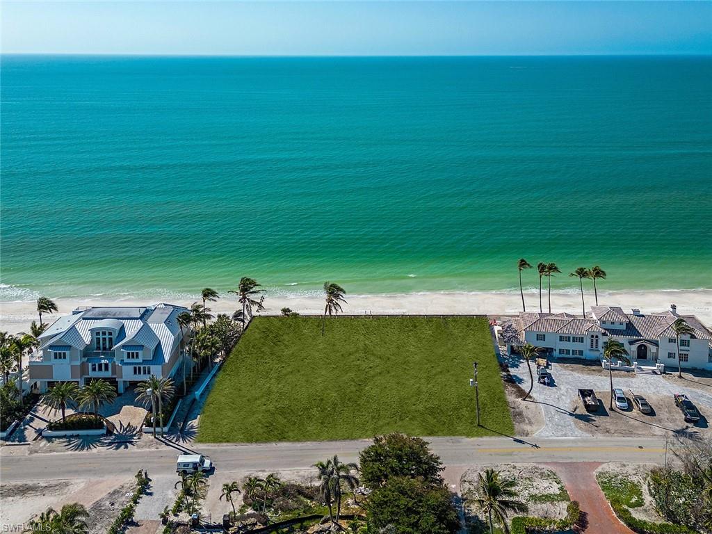 Imagine spectacular sunsets and serene, secluded  walks along the most sought after beach in all of Southwest Florida. With a generous 155 feet of beach frontage, a commanding and panoramic view of the gulf is achievable from nearly every vantage point of a future residence. This extremely rare Port Royal beachfront parcel is eligible for Associate Membership to the prestigious Port Royal Club. Conceptual MHK drawings reflecting a 6 bedroom, 6,700 sq. ft. air-conditioned home are available. *Photos have been altered to show grass on the lot.