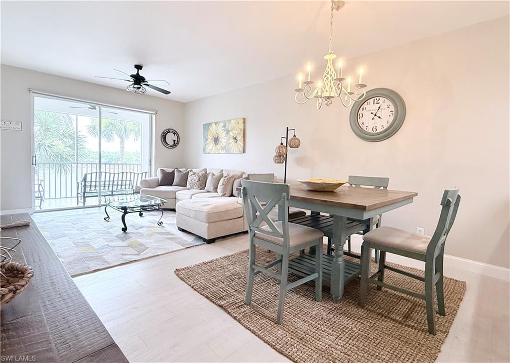 Experience the best of Southwest Florida living (at an incredible price) in this beautifully maintained and tastefully furnished condominium located within the desirable gated community of Naples Heritage Golf & Country Club, where a full golf membership is included with ownership and available immediately—no waiting list required. Offering an exceptional combination of comfort, style, and value, this inviting 2-bedroom, 2-bath residence is ready for you to begin enjoying the Naples lifestyle from day one.
Designed with a desirable split-bedroom floor plan, the home provides privacy for both owners and guests while offering bright, open living spaces ideal for everyday living and entertaining. Expansive sliding glass doors flood the interior with natural light while showcasing tranquil views of the lake, championship golf course, and protected preserve.
Beautifully furnished with a fresh, updated feel, this move-in-ready residence features luxury vinyl plank flooring throughout the main living areas and bedrooms, tile flooring in the entry, kitchen, and baths, adding both style and comfort.
The well-appointed kitchen features white cabinetry, complementary light-toned granite countertops, abundant workspace, newer appliances, a pantry, and a bright breakfast nook for casual dining. The adjoining living and dining areas create an inviting open-concept design, ideal for entertaining or relaxing at home. The spacious primary suite is a peaceful retreat, offering serene lake and golf course views, two walk-in closets, and a private en-suite bath. Thoughtfully positioned on the opposite side of the home, the guest bedroom and adjacent bath provide exceptional privacy and comfort for family and guests.
Step through the living room onto the screened lanai and enjoy one of the home's most captivating features—a peaceful setting overlooking sparkling water, the manicured Par 3 fairway, and a protected preserve. It's the perfect place to enjoy your morning coffee, unwind at the end of the day, or simply take in the spectacular Naples sunsets.
Private storage room is deeded to property along with covered carport parking space. 
Set on 550 acres of picturesque lakes and nature preserves, Naples Heritage is one of Naples' premier bundled golf communities. Residents enjoy an 18-hole championship golf course, driving range, putting green, clubhouse with dining and pro shop, resort-style pool with cabana, fitness center, tennis, pickleball, bocce, and an active social calendar—all just minutes from downtown Naples, Fifth Avenue, and the Gulf beaches.