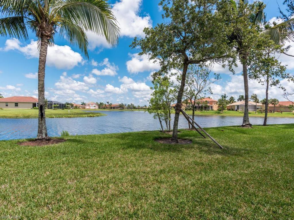 Welcome Home! Enjoy sparkling Lake Views from this lovely attached villa located within the desirable gated community of Reflection Lakes. This 3 Bed 2 Bath home features neutral tile flooring throughout the main living areas, eat-in-kitchen, New Appliances with beautiful wood cabinetry and Corian counters, extended screened-in lanai, storm shutters, and a 2 car garage. Pet friendly community features LOW HOA FEES and includes access to 2 heated pools, fitness center, billiards, bocce court, BBQ area and other great amenities. Just minutes from Downtown Naples and and Marco Island beaches. Call today for your private showing - won't last long!