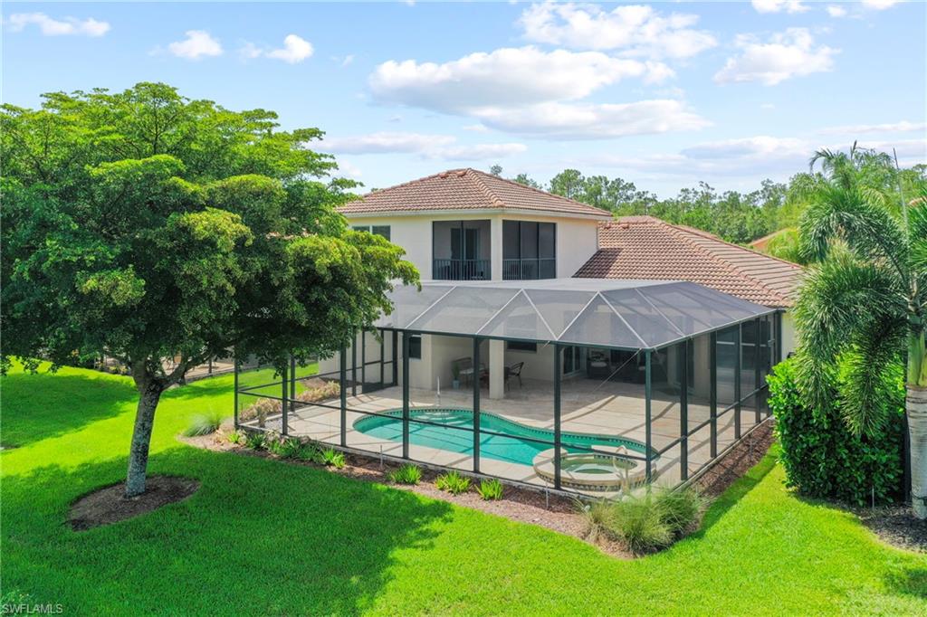 Meticulously maintained by its original owner, this exceptional Weston Grande showcases one of Bella Terra's most versatile floor plans and one of its most breathtaking long lake and preserve views. Perfectly positioned near the front of the community for easy access, this home offers the ideal balance of everyday convenience and peaceful backyard serenity.
Designed for the way people live today, the first floor features three bedrooms, two bathrooms, and all of the main living spaces, allowing the home to live comfortably like a one-story while still offering the added flexibility of a second level. Expansive windows flood the home with natural light and frame the spectacular views, while the extended lanai provides the perfect place to relax, entertain, or simply enjoy the Florida lifestyle.
Upstairs, a spacious 567-square-foot bonus room opens to a private balcony overlooking the lake and preserve. Whether you're dreaming of a media room, home office, fitness studio, game room, guest retreat, or creative space, this flexible room easily adapts to your lifestyle and sets this home apart from anything else in the neighborhood.
Quality construction and thoughtful upgrades provide lasting peace of mind, including impact-resistant windows and doors, a whole-house Generac generator, central vacuum system, newer appliances, updated pool equipment, and a new washer and dryer. Every detail reflects the pride of ownership that is evident throughout this move-in ready home.  For added peace of mind we are not in a flood zone.
Life in Bella Terra is about more than resort-style amenities. Spanning nearly 1,000 acres, with half dedicated to sparkling lakes and protected preserves, this established gated community offers a setting that's becoming increasingly rare in Southwest Florida. Towering trees, mature landscaping, and lush tropical foliage create a sense of beauty and tranquility that simply takes decades to achieve, something many newer communities can't yet offer. Residents enjoy a resort-style clubhouse, pool and spa, 24 hour fitness center, tennis, pickle ball, basketball, volleyball, playground, inline skating rink, soccer and baseball fields, butterfly gardens along with miles of sidewalks perfect for walking, biking, and taking in the natural surroundings. Conveniently located near shopping, dining, entertainment, Southwest Florida International Airport, and the Gulf beaches, Bella Terra continues to be one of Estero's most sought-after places to call home.