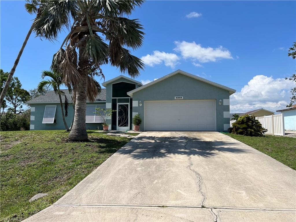 This corner lot home is perfect for those looking for an investment opportunity! Located in the heart of Cape Coral, Florida. Near plenty of shopping, restaurants and a wide array of all kinds of activities. The home comes with a recently replaced roof, and garage door with electric garage door motor as well as window shutters. In the exterior you will find a patio deck over-looking a huge yard in a corner lot. The view in the front of the home is a of a huge open space great for meditating all of life's joys. Schedule your appointment to view a great home.