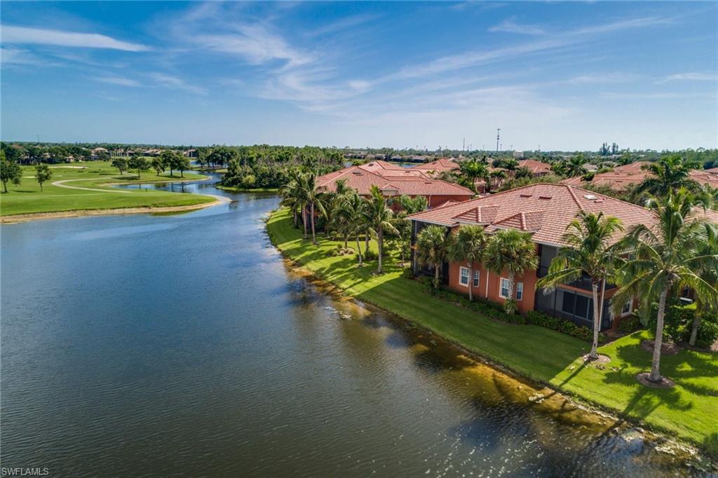 Beautiful upstairs coach home with private elevator.  Nice water views with private side yard while on lanai. Many upgrades including central vacuum system. Newly painted, late 2018 new AC system installed. Pristinely maintained gated community within Lely Resort.  Includes membership access to the first class Players Club and spa nearby.

Wonderful local community pool and clubhouse.