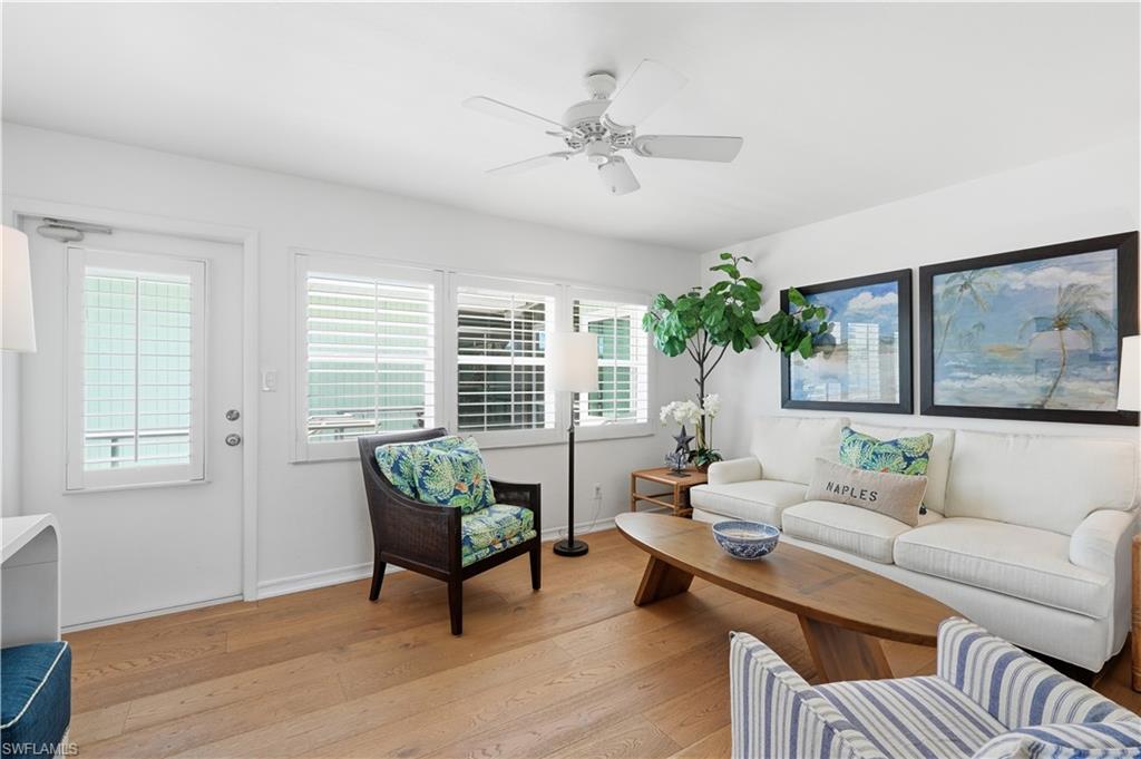 Positioned in the heart of Old Naples, this beautifully updated residence presents an exceptional opportunity to embrace one of Southwest Florida's most coveted coastal lifestyles. Located just three blocks from the sugar-white sands of the Gulf and within an effortless stroll of both 5th Avenue South and 3rd Street South, you'll enjoy world-class dining, boutique shopping, art galleries, and vibrant entertainment right outside your door.

Bathed in natural light, this desirable second-floor end residence offers a bright, airy ambiance enhanced by tasteful neutral finishes, impact-resistant windows and doors, central air conditioning, and the convenience of an in-residence washer and dryer. Just beyond the living space, a private sun-drenched open-air patio provides the perfect setting to enjoy your morning coffee or unwind amid the gentle coastal breezes.

Nestled within the intimate Garden Court community, this charming three-building enclave surrounds a lush, tranquil courtyard, creating a peaceful retreat just moments from the energy of downtown Naples.

Whether you're seeking a seasonal getaway, investment opportunity, or year-round residence, this rare offering delivers the quintessential Old Naples lifestyle—where pristine Gulf waters, breathtaking sunsets, and endless opportunities for dining, shopping, and recreation are all just a short walk away.

Leasing is permitted up to three times per year with a 30-day minimum. Please note that pets are not permitted. One parking space comes with unit.