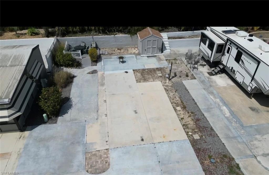 BUY ONE OR BUY BOTH! RARE SIDE-BY-SIDE LOT OPPORTUNITY! VACANT LOT READY FOR YOUR RV, PARK MODEL, OR MANUFACTURED HOME! One of the largest homesites available in America Outdoors, this oversized vacant lot can be purchased individually or together with the adjacent lot at 5020 White Sky Circle, creating one of the largest combined properties in the community.This premium homesite offers the flexibility to design your ideal Florida retreat. Whether you’re looking for extra outdoor living space, additional parking, room for entertaining, or a larger footprint with added privacy, opportunities like this are extremely rare. Purchase one lot or combine both for a truly unique setup that is difficult to find in the community.Own your land outright with low HOA fees and low taxes in the highly desirable gated 55+ community of America Outdoors. Residents enjoy a newly renovated clubhouse, heated pool, hot tub, shuffleboard, bocce, and a full calendar of social activities.
Conveniently located just minutes from Gulf beaches, shopping, dining, entertainment, CVS, Publix, and RSW International Airport. Don’t miss this opportunity to own one of the largest and most versatile homesites in America Outdoors with the option to purchase the adjoining lot and create one of the largest combined properties in the community.