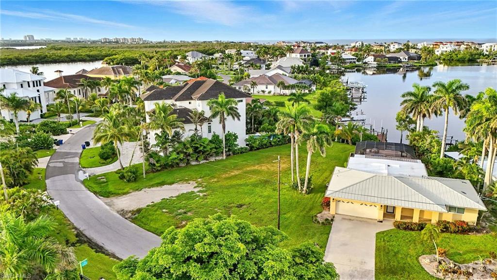 Come and enjoy this beautiful quaint neighborhood of the Carolands  by Bonita Beach

Survey and building plans are available per your request or bring your own design 

It is a pie shaped lot with a boat dock and lift on the Bay and one bridge to the Gulf

Come and build your dream home.   See building plans for existing lot in the attachments

ANOTHER LOT WITH LARGE WATERFRONT ALSO AVAILABLE . LOOK AT THE LAST PICTURES.