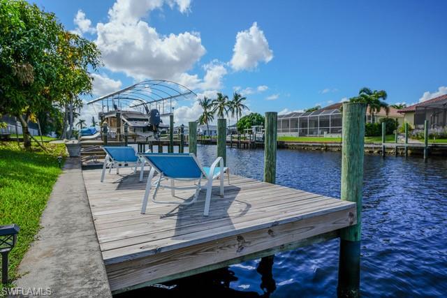 This 3 bedroom 2 bath single level property is  idea for buyers who prefer a low maintenance lifestyle, defined by ease , security and a prime location.

It is located on salt water navigable waterways. It is a boaters paradise, and is convenient to numerous dining and shopping. The residence is filled with

natural light with emphasis on the beautiful water views. Sliders in the Living and Primary bedroom open to your private pool and dock. The  Primary bedroom as an en-suite bath with his and her vanities. It has a two car garage and mature plantings.

This is an opportunity is buy in a well established and welcoming neighborhood  The residence is ready for your personal touches and ideas.

Seller taking highest and best bids by Wednesday, July 15, 2026.