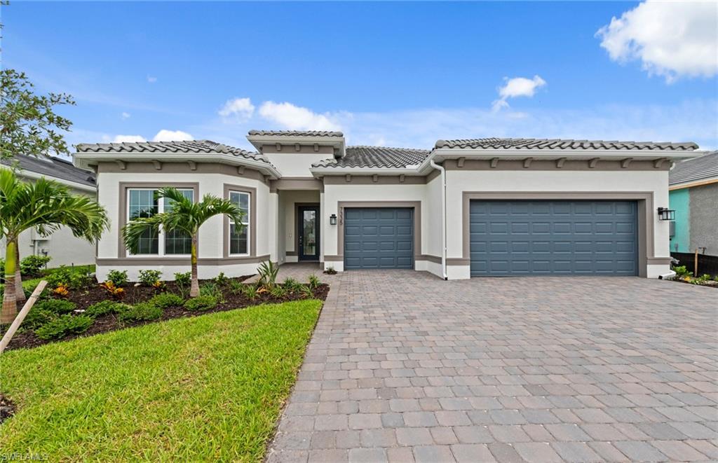 Move to Del Webb at Oak Creek. This brand new Renown home features 3 bedrooms plus den, 3.5 baths, and 3 car garage with 4' garage extension. This home is move-in ready! Includes built-in stainless-steel appliances, white wood cabinets throughout except for the kitchen island has frost color cabinets, quartz countertops, Owners bath with enlarged walk-in shower, walk-in shower at secondary bath, Tray ceiling at gathering room, impact glass, tile flooring in main living areas, carpet in bedrooms, and full laundry upgrade. Enjoy indoor-outdoor living with the zero-corner sliding glass door to the covered screened-in lanai with pool and spa and gorgeous lake views! Oak Creek is Del Webb’s newest 55+ community, situated in North Fort Myers. Homeowners will benefit from it being a natural gas, gated community with vacation-inspired amenities such as a resort style pools and spa, clubs and activities, a restaurant and covered Tiki, and a fulltime lifestyle director. Just beyond the gates homeowners can find shopping and dining, explore Fort Myers River District, relax on the Gulf Coast beaches, and experience new recreational activities while still being only minutes from everyday conveniences.