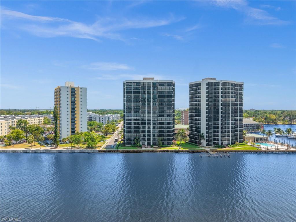 Welcome to your 9th-floor slice of paradise with expansive, unobstructed views of the Caloosahatchee River in the highly sought-after Pointe Royale community of Downtown Fort Myers. This spacious 3-bedroom, 2-bathroom condo offers 1,715 square feet of comfortable living space. Wake up to breathtaking sunrises and wind down with gorgeous sunsets from your huge, screened-in lanai—perfect for entertaining or relaxing. The large eat-in kitchen features sleek stainless steel appliances, modern cabinetry, and stylish countertops. The oversized primary bedroom boasts sliding doors to the lanai, filling the space with natural light and river breezes. Enjoy plenty of storage with abundant closet space, a full-size laundry room with a utility sink, and an additional storage unit just outside your door. For added peace of mind and comfort, the condo features a new roof and a new A/C system with a 10 year warranty. These are valuable upgrades that ensure efficiency and reliability for years to come. The unit includes one covered parking garage spot with extra open parking available for guests. Pointe Royale offers professional on-site management, 24/7 guard-gated security, and a host of resort-style amenities. Residents enjoy a river-side pool and clubhouse, fitness center, tennis and pickleball courts, and a vibrant community calendar. Take a short walk or trolley ride to the heart of Downtown Fort Myers for restaurants, events, and entertainment. Conveniently located near Publix, Lee Memorial Hospital, SWFL International Airport, and major roads. Discover the perfect blend of security, serenity, and accessibility in this exceptional riverfront condo!