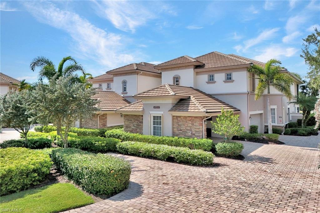 Welcome to this stunning second-floor coach home in The Quarry, offering just under 2,300 square feet of thoughtfully designed living space. Impeccably maintained, this residence features three bedrooms plus a versatile home office—or optional fourth bedroom—along with two full baths and one half bath. Upgraded plantation shutters and a soft, neutral color palette throughout create a sophisticated, designer-inspired ambiance. Upon entry, you are immediately captivated by the open-concept floor plan, where each living space transitions effortlessly into the next. The tiled lanai serves as a seamless extension of the interior, inviting you to embrace the Naples lifestyle while enjoying serene waterway views that stretch to Boulder Lake. Savor breathtaking sunrises with your morning coffee and unwind in the evening with spectacular sunset views from your private outdoor retreat. The beautifully updated kitchen is both stylish and functional, featuring modern white cabinetry, elegant quartzite countertops, and a striking tiled backsplash, perfectly suited for everyday living and entertainment. The spacious dining area, bathed in natural light, provides an inviting setting for gathering with family and friends. Experience a true sanctuary in your primary suite complete with private access to the lanai, custom His-and-Her walk-in closets, and a spa-inspired en-suite bath. Highlights include dual vanities, a soaking tub, a step-in shower, and a private water closet—delivering both comfort and luxury. For added peace of mind, the home is equipped with remote-controlled electric hurricane shutters on the lanai, accessible via smartphone, as well as accordion hurricane shutters on all windows, conveniently operated from inside the home. Offered partially furnished and freshly painted, this move-in-ready residence also includes a two-car attached garage featuring epoxy flooring, upgraded metal cabinetry, and a dedicated workspace. The Quarry community offers an exceptional lifestyle with a wide array of resort-style amenities. The renovated Beach Club, located within walking distance, serves as the social hub with both casual and fine dining options. A two-story fitness center offers a variety of classes and wellness programs, while tennis, pickleball, and bocce courts cater to active lifestyles. Golf enthusiasts will appreciate the private 18-hole championship course designed by the renowned Hurdzan-Fry team. Surrounded by natural beauty, The Quarry features over 500 acres of navigable lakes, ideal for boating, kayaking, paddleboarding, and fishing. Scenic walking trails wind through preserved landscapes, offering peaceful opportunities to connect with nature. Thoughtfully designed and meticulously maintained, this residence presents a rare opportunity to enjoy refined, resort-style living in one of Naples' most sought-after communities.