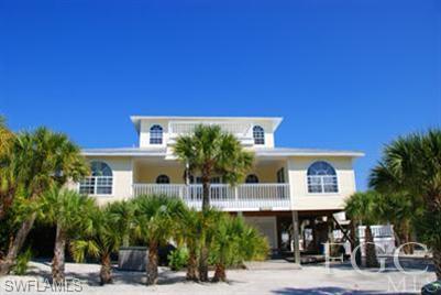 Under Contract with Kickout Clause.  Room for everyone with over 2000 square feet of living space. This charming 3 bedroom and 3 bath island home is just a short stroll from the NCIC amenities and INCLUDES a membership to the club.   Large living areas and front porch create plenty of places to relax. The spacious covered screen porch is the ideal place for outdoor living with oversized sliding glass doors that open up the great room/kitchen on three sides.  Your own private heated pool is right outside the front door and placed on the south side of the house for maximum exposure for sunny days.  Views of the quaint island club and harbor from the upper levels and crows nest - watch the boats along the intracoastal and catch a
