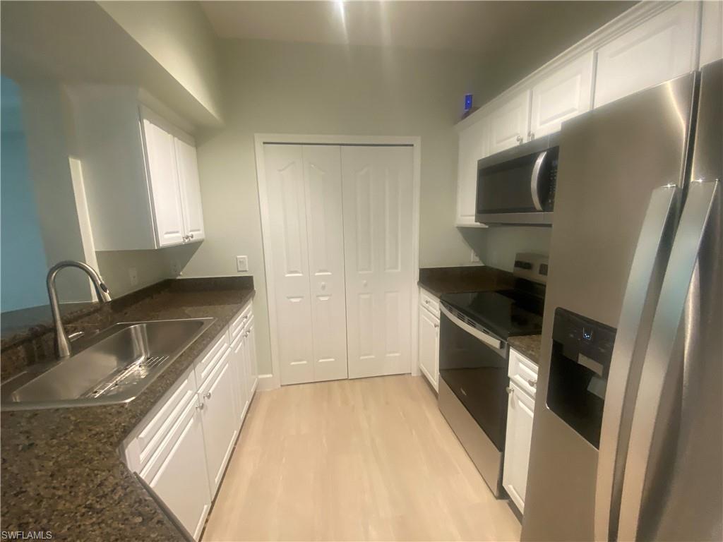Come see this updated 1st floor 2 bedroom 2 bath condo with an attached garage. Updates include new Ac unit, New water heater, new flooring, base molding, washer, dryer, stainless kitchen appliances, new faucets, fixtures, sinks and the list goes on! Building in the process of adding impact windows and seller has paid the additional fee to upgrade to impact sliders! Positano Place is a gated community in Central Naples that offers a resort style pool, clubhouse, fitness center, car care facility and play area. Make this your new home and start living the Naples lifestyle today.