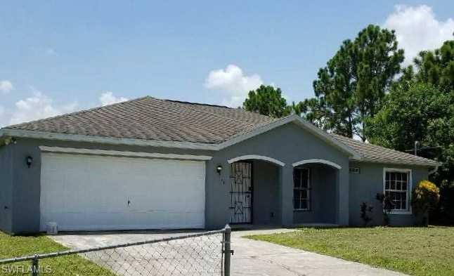 BIG Price Reduction!  Perfect for the growing family! 4 Bedrooms! Fenced in yard! Screened Lanai and front porch!    Freshly painted interior.    Exterior painted in 2017. There is a security system in place and monitored.  Spacious kitchen with sliding doors to the lanai.    Easy access to State Rd. 82.