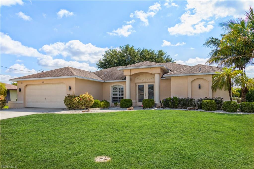 Must see pool home!! Freshly painted inside features a 4 bedroom, 2 full bath, 2 car garage.  Large family room adjoining the open updated kitchen with granite counter tops, stainless steel appliances, and cherry cabinets.  Three bedrooms are split from the master suite.  Dining room over looking the paved pool screened lanai.  Close to everything.