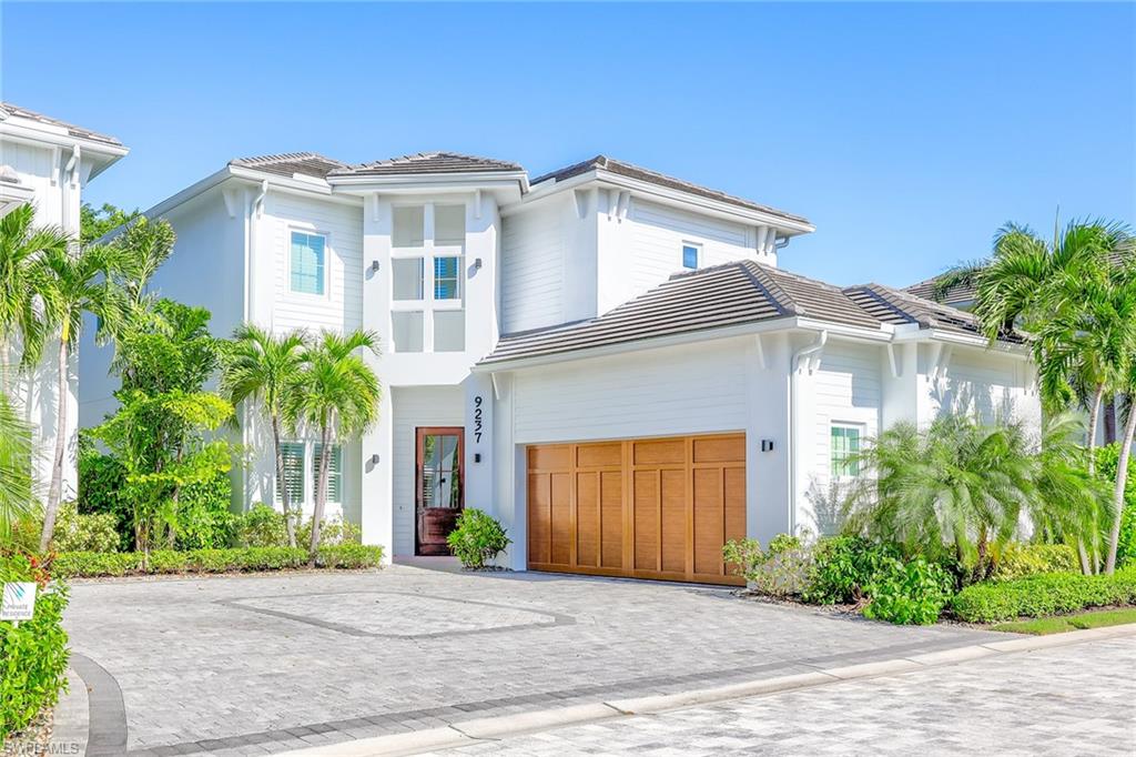 Enjoy all that Mercato has to offer just outside your gated community. 
Discover the ease of luxury urban living in this stunning single-family home located in the prestigious community of the Residences at Mercato. Meticulously crafted by renowned builders, Lutgert Construction, and designed by the esteemed MHK Architecture, this two-story masterpiece exudes sophistication and charm. Upon entering, you're greeted by an ambiance of coastal elegance, highlighted by expansive wood flooring that seamlessly flows throughout. Soaring two-story ceilings and an abundance of windows drench the interiors in natural light, creating an inviting and airy atmosphere. Boasting two primary suites, each adorned with custom-built closets and lavish baths. A thoughtfully designed office/den with custom built-ins and a full bath on the main level offers versatility and convenience. Entertain in style within the tranquil courtyard oasis, featuring a sparkling saltwater pool, captivating water wall feature, and a custom outdoor kitchen complete with stunning quartz countertops and backsplash. Whether hosting gatherings or savoring moments of relaxation, this outdoor sanctuary provides the perfect backdrop for every occasion. Experience a maintenance-free lifestyle at the Residences, where HOA amenities include pool cleaning, lawn maintenance, exterior pest control, window cleaning, and pressure washing—ensuring effortless living at its finest. Just outside your private gated community is Mercato with an array of upscale shops, fine dining establishments, chic salons, convenient banks, and the renowned Whole Foods market. Indulge in the ultimate blend of luxury and convenience, at this remarkable residence in the heart of Mercato. 
Just 1.7 miles to Vanderbilt Beach.
