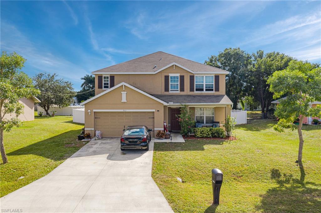 This 2016 built 5 bedroom 2.5 bath family home is located in central Cape Coral close to everything in the Cape. No flood insurance is needed to own this home.  Wood and tile flooring is installing the main living area.  Spacious open concept kitchen with pantry.  Large master bedroom located on the ground floor for convenience will need new flooring.  The upstairs includes 4 more bedrooms as well as a large bonus room which could be a 2nd family room, rec room, or kids play area.  The back yard is fenced in with a 6' poly privacy fence. This home is priced well as it needs a little TLC.