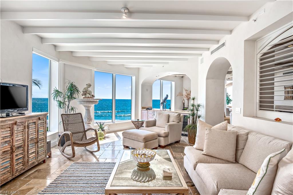 Welcome home to your luxury beachfront retreat! Sancerre, located in the Moorings, is one of the most exclusive buildings in all of Naples. With only 23 residences in total and Top-notch 24-hour concierge services, this building leads the way in luxury beachfront living. You will immediately feel welcomed by the friendly staff and warm design. Relax by the resort-style pool by day and gather with friends at night by the outdoor fire place or one of the fire pits. Residence 301 welcomes you with relaxing tones and endless views of the beach and the Gulf of Mexico. This well-thought-out floor plan of over 4,000 sqft is open and airy yet perfectly intimate. The attention to detail is noticeable throughout. Custom beam work dresses the volume ceilings in the living areas, and you will be delighted by the deliberate pops of color. You will love to cook in the spacious kitchen with the gas cooktop, island, chef's sink, and walk-in pantry. Take in the sunset at night through any of the large picture windows or from your spacious screened lanai overlooking the sugar sand. This is true "toes in the sand" luxury living at its best! Located close to downtown Naples, shops, and dining.