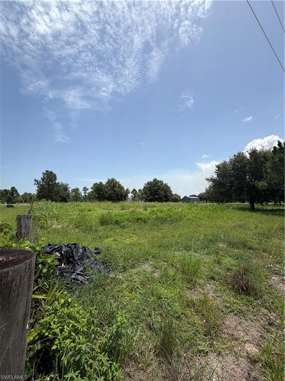 Oversized 1.25-acre lot already cleared and prepared for construction. Seller has building plans and materials available, offering a great opportunity for a fast start on your new home. Located just south of Wheeler Rd, this parcel provides privacy, open space, and flexible residential use. No HOA and no deed restrictions. Easy access to Lehigh Acres, SR-80, and SR-82. Lot dimensions: 152 x 321 x 152 x 321. Parcel ID: 1-28-44-31-A00-0039.0000. Buyer to verify zoning, land use, and utility availability.
