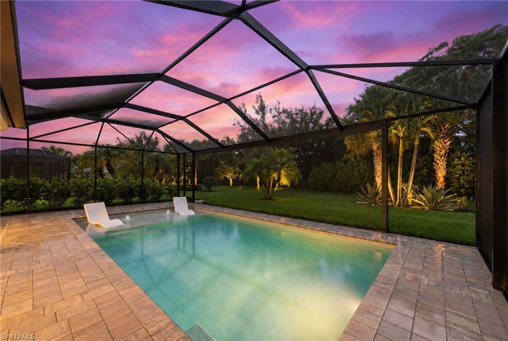 Immaculate and move-in ready with a new pool! The Preserve at Corkscrew is located in preferred zone X outside
of the flood zone for extra peace of mind. This lovely home has full hurricane protection, including electric shutters on the lanai, hurricane glass/windows on the front of the house, and accordion hurricane shutters on the sides- nothing to worry about here! The spacious and private backyard offers a sparkling pool with sun shelf and picture window screen enclosure. This IMMACULATE home was built in 2013 and looks like a model. Built by Pulte builders, the popular Vernon Hill II floor plan offers a large open great room, three bedrooms, a den, 2 bathrooms, and a finished two-car garage with an additional four feet extension and epoxy flooring for durability. Step inside to discover large diagonal tile flooring and a freshly painted interior. The gourmet kitchen showcases upgraded granite countertops, a stylish tile backsplash, stainless steel appliances, rubbed bronze faucets, soft-close drawers, and plenty of storage with rich cabinetry expanding into the bright eat-in area. The great room is ideal for entertaining, with a surround sound system and a formal dining area. Crown molding enhances the elegance of all major living spaces. Retreat to the spacious primary bedroom, with dual vanities, a relaxing bathtub, and a frameless glass shower equipped with handheld and rain shower heads. The Preserve at Corkscrew is an incredible nature-filled gated community with dedicated nature preserves, numerous lakes, street lights, and sidewalks. There is an active social committee with ongoing activities, and of course, PICKLEBALL is HUGE. You can even learn the sport on
certain nights. The location is just minutes from I-75, world-renowned shopping & dining, beautiful beaches, award-winning golf, Hertz Arena, Naples, FGCU, & RSW Airport. Low HOA fees include all lawn maintenance with resort-style amenities, including a fully equipped gym, yoga/flex room, tot lot, tennis/pickleball courts, a resort-style pool with cabanas, palm trees, and a deck overlooking the lake.