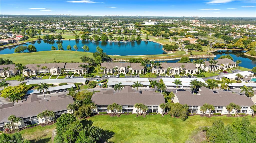 Experience the pinnacle of Southwest Florida living in this beautifully remodeled two-bedroom, two-bathroom condo located in the highly desirable gated community of Stoneybrook at Estero. This residence has been thoughtfully upgraded with high-end finishes throughout, featuring elegant engineered hardwood flooring that flows seamlessly through every room and sophisticated shaker-style cabinetry in both the kitchen and bathrooms. Every surface is adorned with premium, high-level granite countertops, while the installation of storm-resistant windows and sliding glass doors provides both modern aesthetic appeal and ultimate peace of mind. The interior living space opens up to breathtaking, wide-open golf course views that create a sense of serene tranquility and expansive space. For added convenience, the home includes a dedicated covered carport and a private storage closet perfect for outdoor gear. Residents of Stoneybrook enjoy access to a premier public golf course, offering a championship experience without the burden of mandatory membership fees, alongside a wealth of community amenities. Perfectly situated in the heart of Estero, this home is just minutes away from world-class shopping at Miromar Outlets, premier entertainment at Hertz Arena, and the campus of Florida Gulf Coast University.