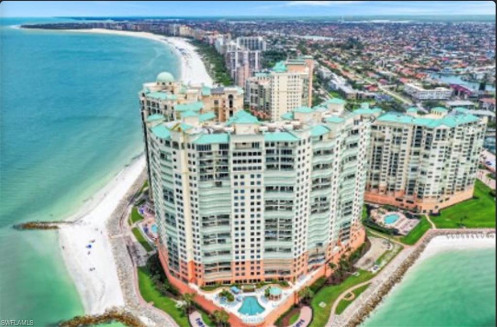 STUNNING !! This is what best describes this incredible, fully furnished, turnkey residence. Beautifully remodeled, with the very best in finishes and furnishings. Amazing water views and sight lines throughout the home. Includes a highly sought after, air conditioned, 2 car plus garage. This 4 bedroom, 4 1/2 bath condo includes an inviting den w/fireplace and an amazing kitchen area, that would make any chef envious. A tremendous value when you consider the cost to remodel at this level. Just a beautiful property !! This is perfection !!