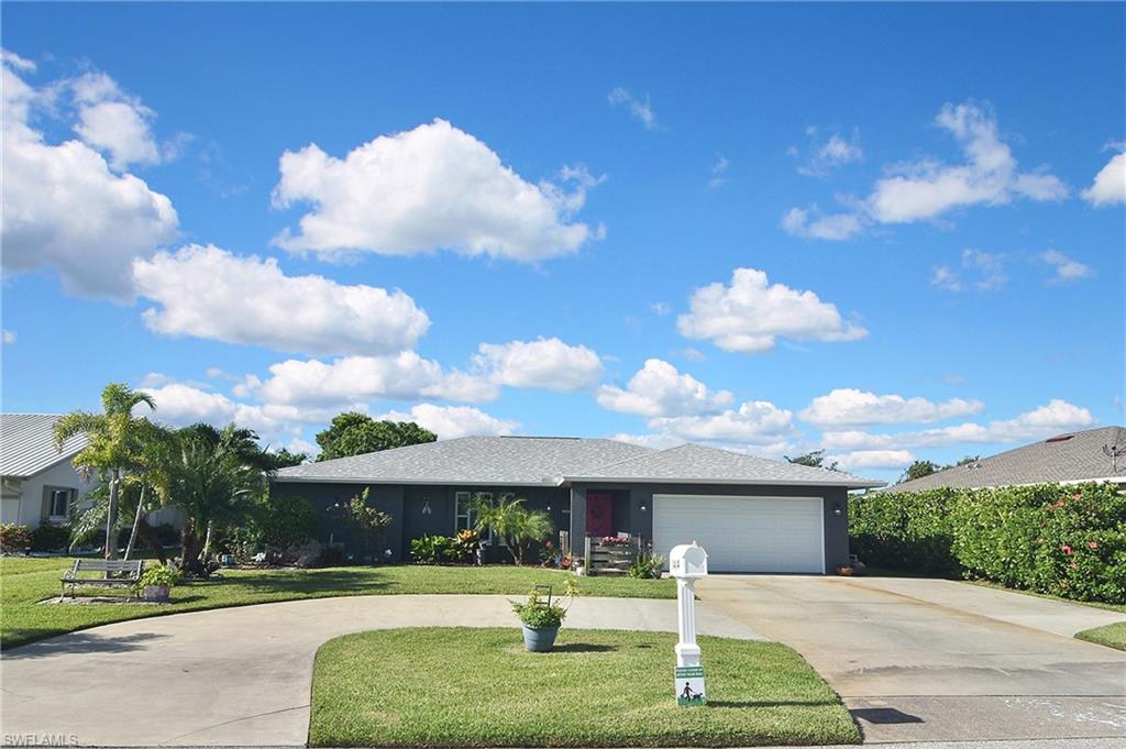 Are you ready to move? This move in ready home is waiting for you. Beautifully updated 3/2 Pool Home in desirable SE Cape Coral with southern exposure. New 2023 roof with new ductwork, insulation, and whole house gutters. Interior boasts luxury 9" plank vinyl flooring, custom barn doors, a modern kitchen with level 5 quartz countertops, GE Chef Grade Appliances. The home offers multiple living areas including a bonus room with 403 sq ft of under air space. Pool, cage, and heater 2022, A/C 2022, Electric Panel 2021, paint 2022, hurricane windows 2022, circle driveway 2020. Spacious backyard with new sprinkler system and large shade tree. Not in a flood zone! This home will not disappoint.