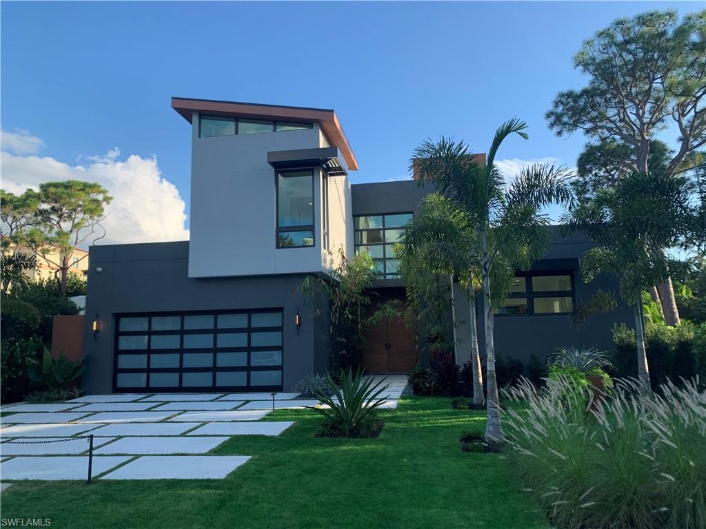 This home is pending. HOMESITES ARE AVAILABLE TO DUPLICATE HOME NEARBY. Meticulously crafted by Naples only Florida Home Builders Association “Builder of the Year”, Kaye Lifestyle Homes Custom Home Division offers the finest of Modern Mid-Century Design. Located at the end of a private cul de sac, enter through the Zen garden and 10' custom walnut doors. This bright and open concept lends itself perfectly for entertaining and year-round living. A spacious great room with floor to ceiling impact sliders flows into a gracious modern dining room overlooking your covered outdoor entertaining area.  The chef’s kitchen features custom matched maple cabinets with the finest appliances. The oversized en-suite den doubles as both a study and retreat. Your large lanai features a deluxe outdoor kitchen, generous entertaining area and linear pool/spa.  On the second level you’re greeted with a loft overlooking the foyer, a wet bar dedicated for entertaining and two additional en-suite bedrooms.   
Walking distance to Waterside Shops, and Clam Pass is just  a tram ride to the beach!