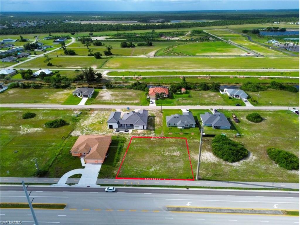 Exceptional opportunity to own an oversized triple lot in the growing NW Cape Coral area! Build your dream home or invest in one of the city's fastest-growing neighborhoods. Conveniently located near schools, shopping, dining, golf courses, Burnt Store Rd., Pine Island Rd., and the upcoming Crystal Lake Park. According to available information, the property's Future Land Use designation is SM (Single-Family/Multi-Family). Buyer and Buyer's Agent are responsible for independently verifying all information, including zoning, permitted uses, Future Land Use, utilities, dimensions, and any current or future assessments with the City of Cape Coral and all applicable governmental authorities.
