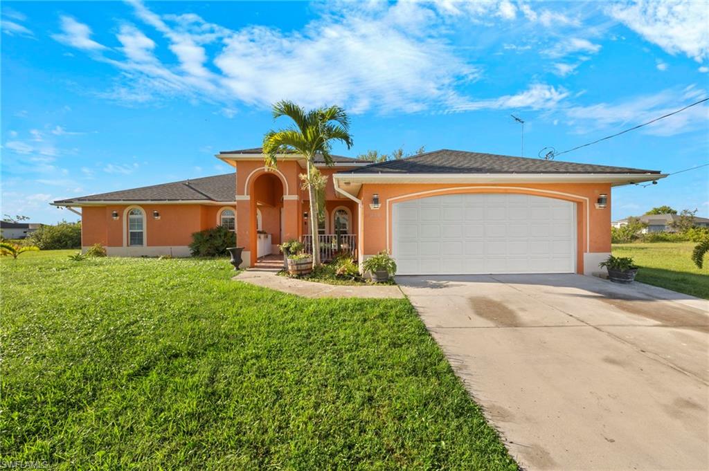 Welcome to your energy efficient waterfront paradise. This 3 bedroom plus den home has a Southern rear exposure and sits on a navigable freshwater canal. Fish off of your covered dock or hop in your boat to cruise the canal system. If you aren't in the mood for a boat ride, check out the views on the huge screened lanai while you relax in your own private spa. Recent updates include a 2023 roof, newer porcelain tile floors throughout the house, newer stainless kitchen appliances, newer laundry appliances, and a Wi-Fi thermostat. The solar panels on this home make it more affordable by saving a substantial amount of money on electricity. Seller will pay off balance of solar loan at closing, so the benefit of this system could be all yours! The city just repaved the roads and city utilities for water, sewer, and irrigation are in and hooked up. Did I mention that there is room for a pool. Schedule your showing appointment today to see what you've been missing!
