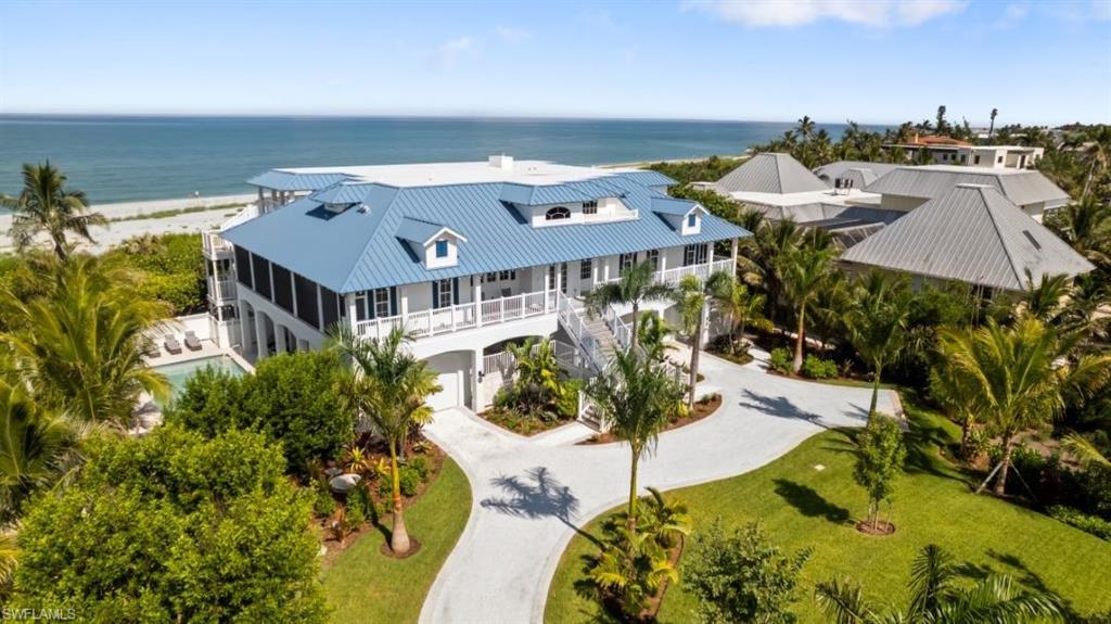 Experience inspired luxury and unmatched rental potential at Shell Seekers, a one-of-a-kind Captiva Island beach estate. Shell Seekers enjoys an enviable position on Captiva Drive, offering both privacy and easy access to the island's renowned restaurants, shopping, and recreational activities. The property's Gulf-front location ensures permanent unobstructed water views and direct beach access – a rarity that becomes more precious each year. This 6-bedroom, 7.5-bath masterpiece embraces Olde Florida architecture with modern comforts. Expansive screened and open porches invite seamless indoor-outdoor living, ideal for elegant entertaining or quiet evenings as the sun sets over the jeweled-toned waters of the Gulf.

Step inside to soaring two-story coffered ceilings, a dramatic great room, and a gourmet kitchen designed for hosting at scale. Finishes include crown molding, hardwood floors, coastal-inspired décor, and multiple gathering spaces tailored for multi-generational living. The private top-floor primary suite features a fireplace, sitting area, and sweeping Gulf vistas. With an elevator, guest suites, a loft, and a flexible floor plan, this residence adapts effortlessly to families and guests alike.

The outdoor living spaces are equally impressive, featuring a heated pool and spa, expansive decking, and direct access to Captiva's pristine Gulf beaches. Multiple covered and open terraces provide the perfect setting to enjoy spectacular sunsets and the island's legendary shelling opportunities right at your doorstep. Hardie board siding, impact-rated windows, and a whole-home generator provide beauty, function, and peace of mind.

A rare opportunity to own one of Captiva's most iconic Gulf-front properties—whether as a private retreat, a showpiece for entertaining, or a legacy investment with proven returns.

New roof, new A/C, new flooring, new appliances - completely remodeled like new.