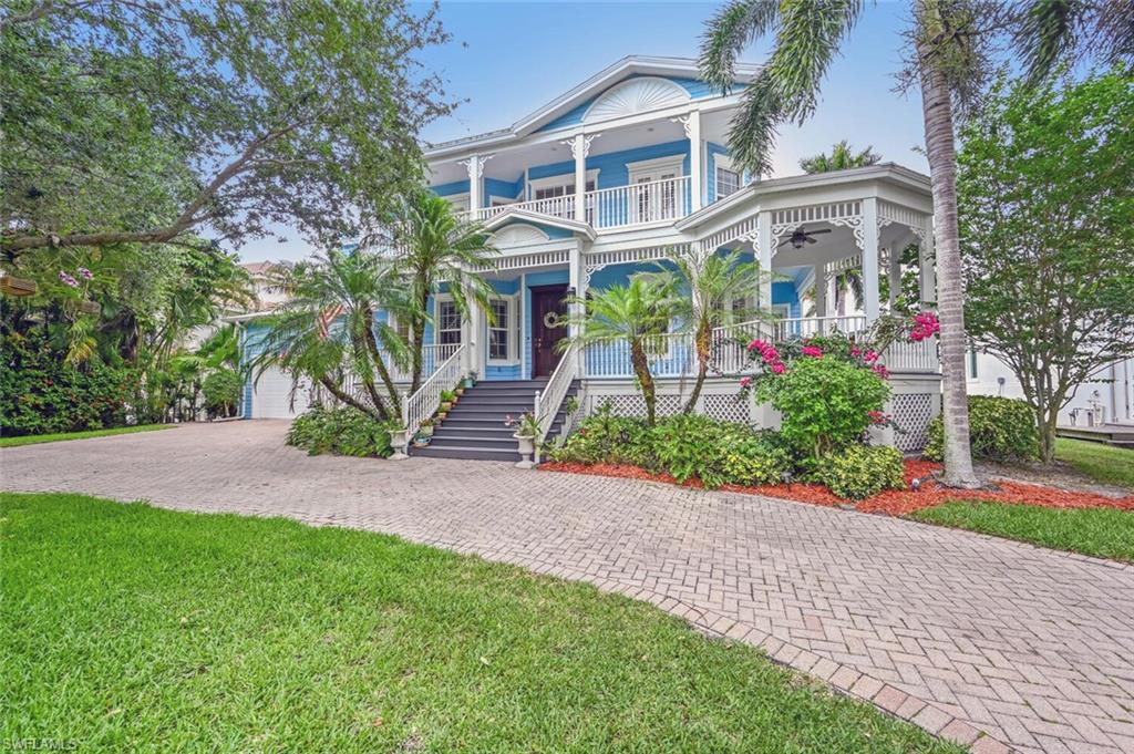 Come home to the warm Florida Charm of this modern Cottage style home.  Built for any lifestyle, this home is located on one of the deepest canals available in this area, with direct Gulf access and no bridges!  Entertain friends and family around the pool under the oversized screened lanai, or simply enjoy an evening on one of the wrap around porches!  This home offers over 3300 Sq Ft of living space, and is situated near the heart of Naples.
Welcome Home, Welcome to Paradise!
