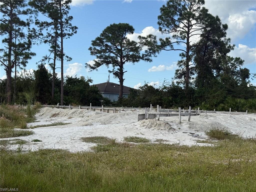 This prime corner lot offers a rare opportunity for developers or investors looking to build in a centrally located, high-demand area. Zoned for multi-family/duplex use, the property is fully cleared and ready for immediate development. Even better, permits for a duplex have already been issued, and all impact fees have been paid—saving you time and money. Simply pick up where the previous plans left off and start building. The lot’s strategic corner location provides excellent visibility and access, making it ideal for rental units or resale. Situated in a well-established neighborhood, the property is just minutes from schools, shopping centers, parks, and everyday necessities. With convenient access to major roads and community amenities, this location offers the perfect blend of convenience and livability. Whether you're looking to expand your investment portfolio or build a new income-generating property, this ready-to-go lot is a smart and seamless opportunity.