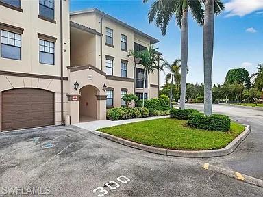 Exceptional 3-bedroom Rental residence featuring a rare attached oversized garage, offering the convenience and privacy of single-family living with the ease of a condominium. This highly desirable first-floor end unit delivers a bright, open layout with three spacious bedrooms, three walk-in closets, and two bathrooms. A private, sunny screened lanai with lake view extends the living space, creating an ideal setting for relaxation or entertaining. The interior showcases tile flooring throughout, a generous main living area, and three bedrooms designed for comfort and functionality. New impact windows are scheduled for installation, providing enhanced value, efficiency, and peace of mind. Located within an elevator-access, pet-friendly community, the residence is just steps from the resort-style amenities and your assigned parking. Positano Place is a gated, amenity-rich neighborhood featuring scenic lakes with illuminated fountains and mature landscaping. Residents enjoy a full suite of upscale amenities, including a grand clubhouse with soaring ceilings, executive business center, media room, internet café, and a state-of-the-art fitness facility. Outdoor features include a lakeside resort-style pool and spa, gazebo with Jacuzzi, outdoor sports bar with television, billiards room, and a dedicated car care center. Ideally positioned on Livingston Road just south of Pine Ridge, this location offers convenient access to Naples’ premier destinations.