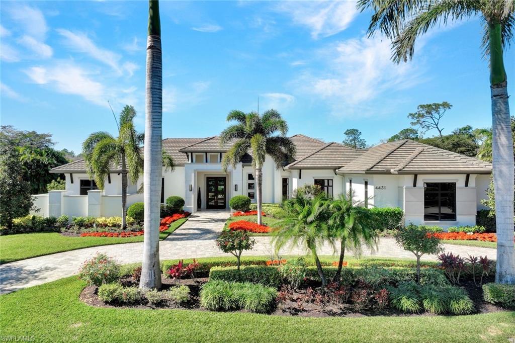 Elegance and luxury meet functionality in this exquisite custom estate behind the gates of one of Naples’ most exclusive communities, Quail West. Immediate GOLF MEMBERSHIP and BEACH CLUB MEMBERSHIP available! This luxurious McGarvey built residence boasts unparalleled craftsmanship, panoramic golf course views and an opulent blend of sophistication and comfort. The inviting foyer sets the stage for what’s to come, revealing a preview of the outdoor oasis that awaits beyond the floor to ceiling glass windows. Indulge your culinary passions in the chef’s dream kitchen, featuring two islands and appointed with top-of-the-line Wolf appliances, Sub Zero Refrigerator and Freezer, and two Bosch dishwashers. The epitome of open-concept, each space effortlessly unfolds into the next. Pocketing glass doors disappear, seamlessly adjoining indoor and outdoor living spaces. The grandiose lanai boasts saltwater pool and spa, dual sided fireplace, fire pit and outdoor kitchen. Additional highlights include Control4 smart automation, temperature controlled wine cellar, media/cinema room, whole house generator and much, much more. Start living the life you’ve been dreaming about, today!