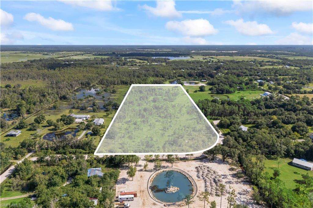 Incredible opportunity to own 13.43 acres of high and dry land in a peaceful area of North Fort Myers. Located at 20421 Welborn Road, this expansive parcel offers approximately 441 feet of frontage by 1,294 feet of depth, providing ample space for your dream estate, agricultural pursuits, or private compound.
Zoned AG-2 (Agricultural), the land is fenced and cleared with open pasture and scenic pond views. Electricity is available at the road, and the site is well-positioned for future improvements or development.
Conveniently located just minutes from US-41, I-75, shopping, and dining—but tucked away in a quiet setting—this property offers the best of both worlds. Whether you're seeking land for recreation, homesteading, or investment, this is a rare find in a growing area of Lee County. Don’t miss this chance to own a large, usable piece of Southwest Florida.